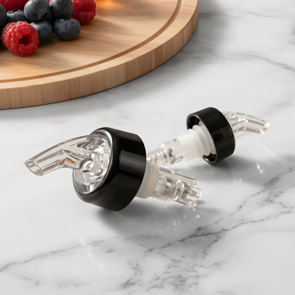 1.5 oz measured pourers on a home bar counter