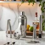 8-piece cobbler shaker cocktail set on a home bar counter