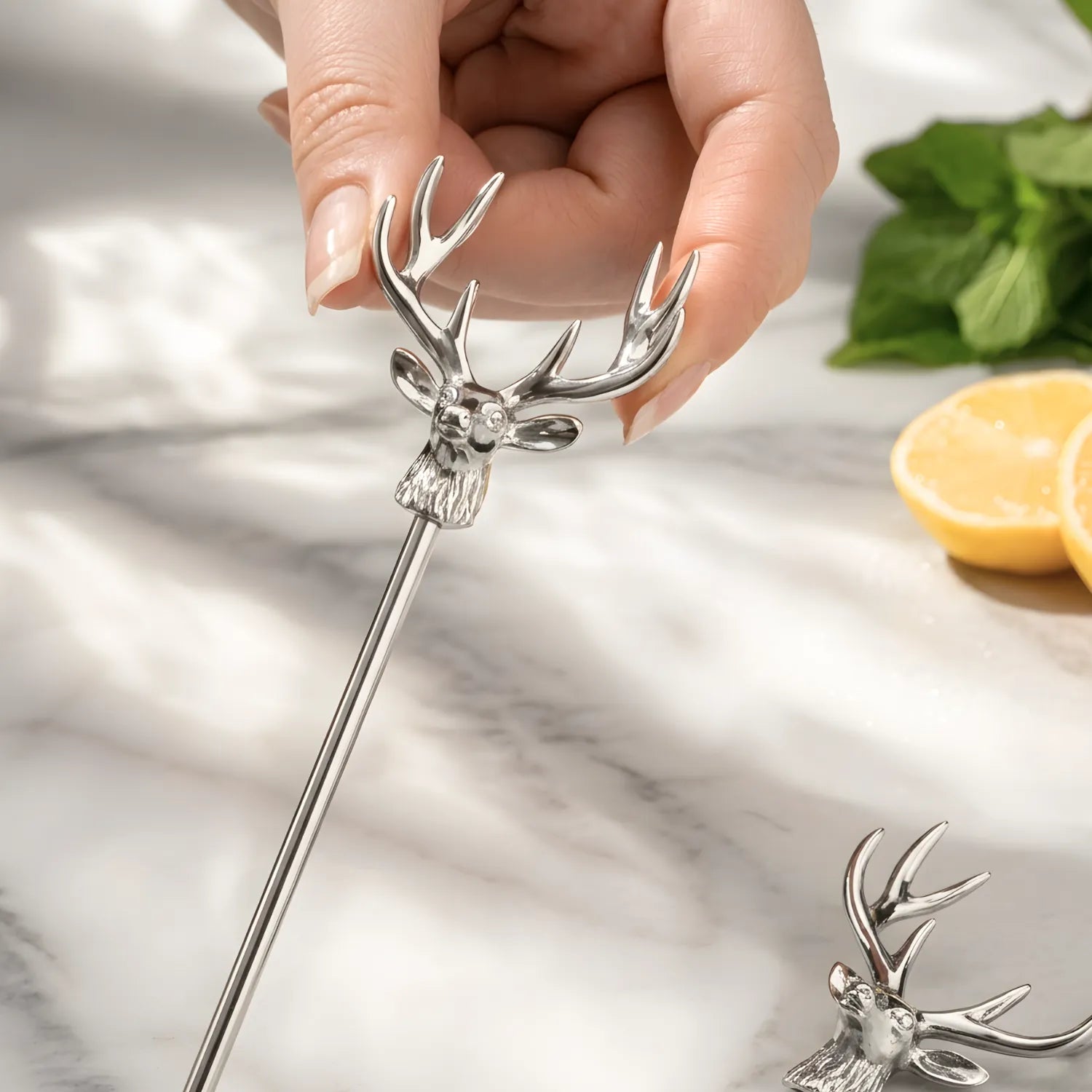 deer head swizzle stick detail view