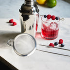 fine mesh strainer next to a shaker