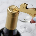 gold wine key with a foil cutter