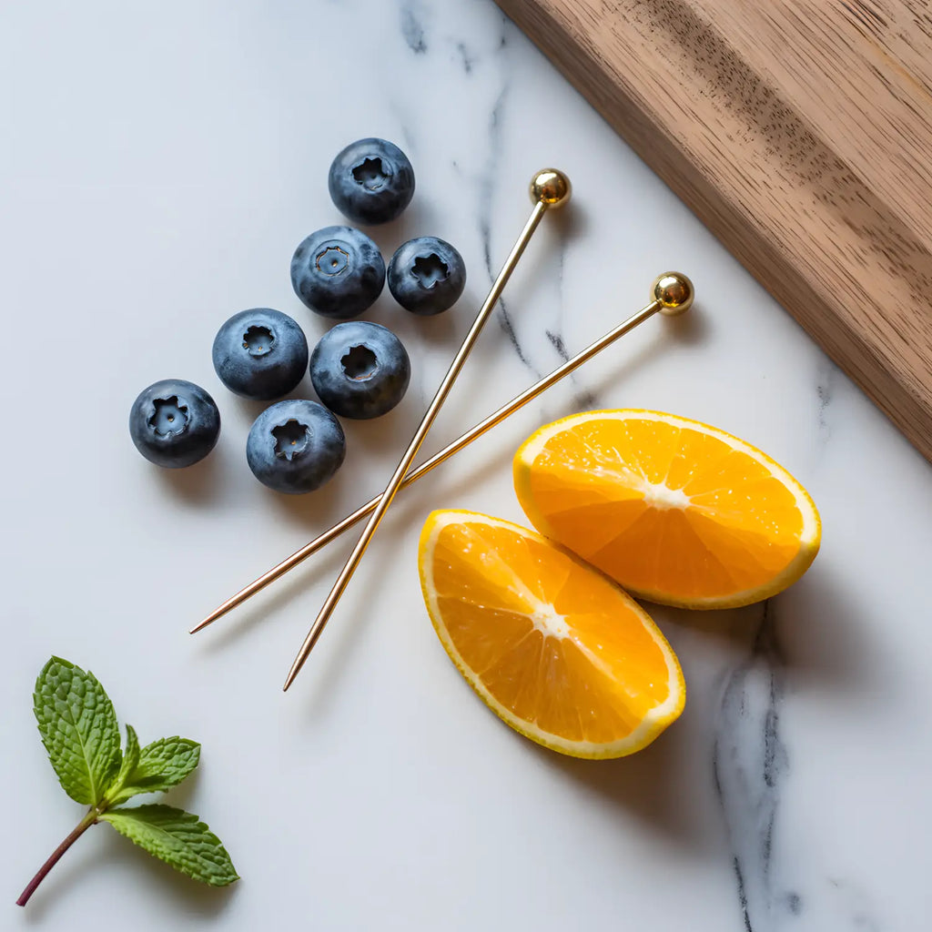 gold ball cocktail picks on a home bar counter