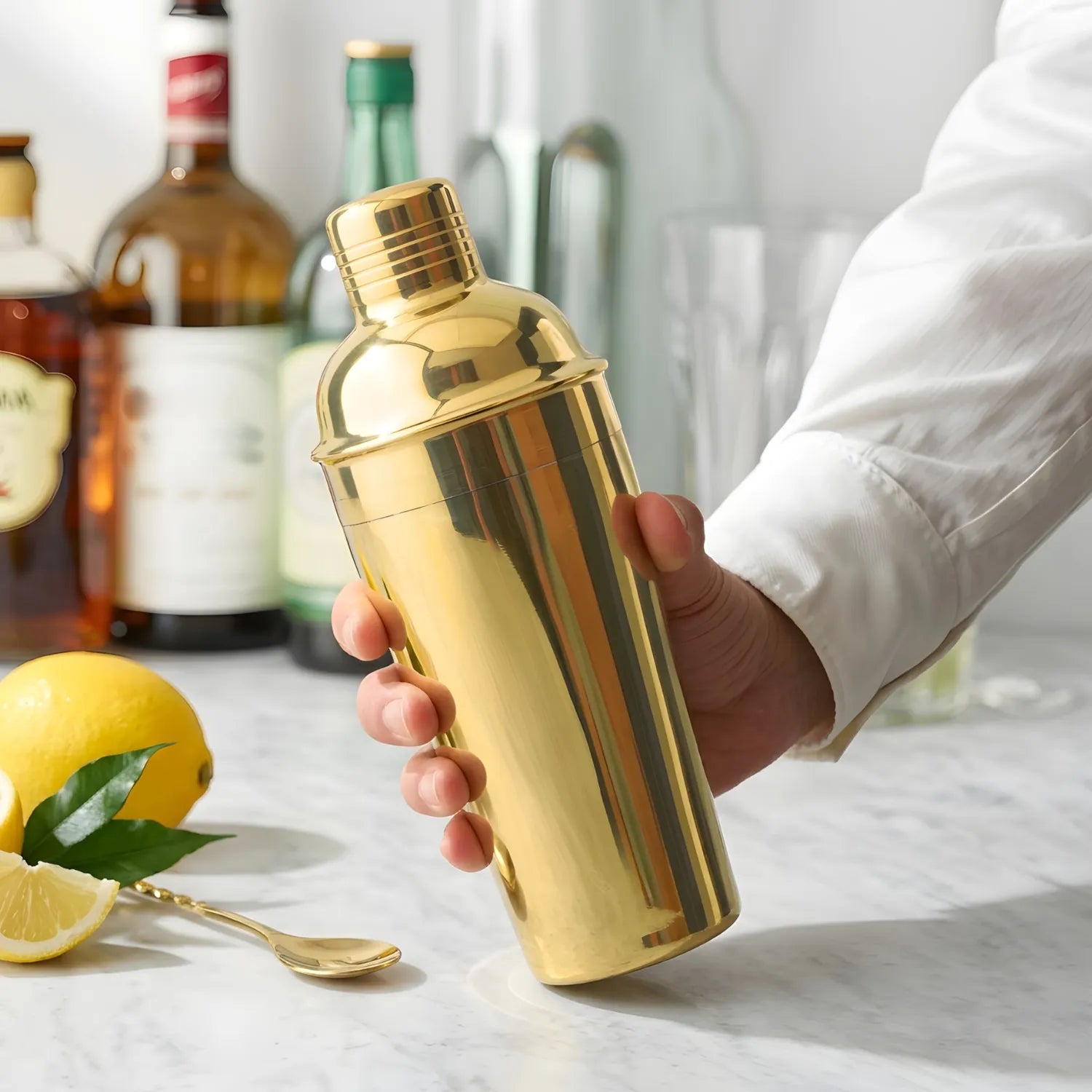 gold 8-piece cobbler shaker cocktail set in use