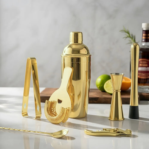 gold 8-piece cobbler shaker cocktail set on a home bar counter