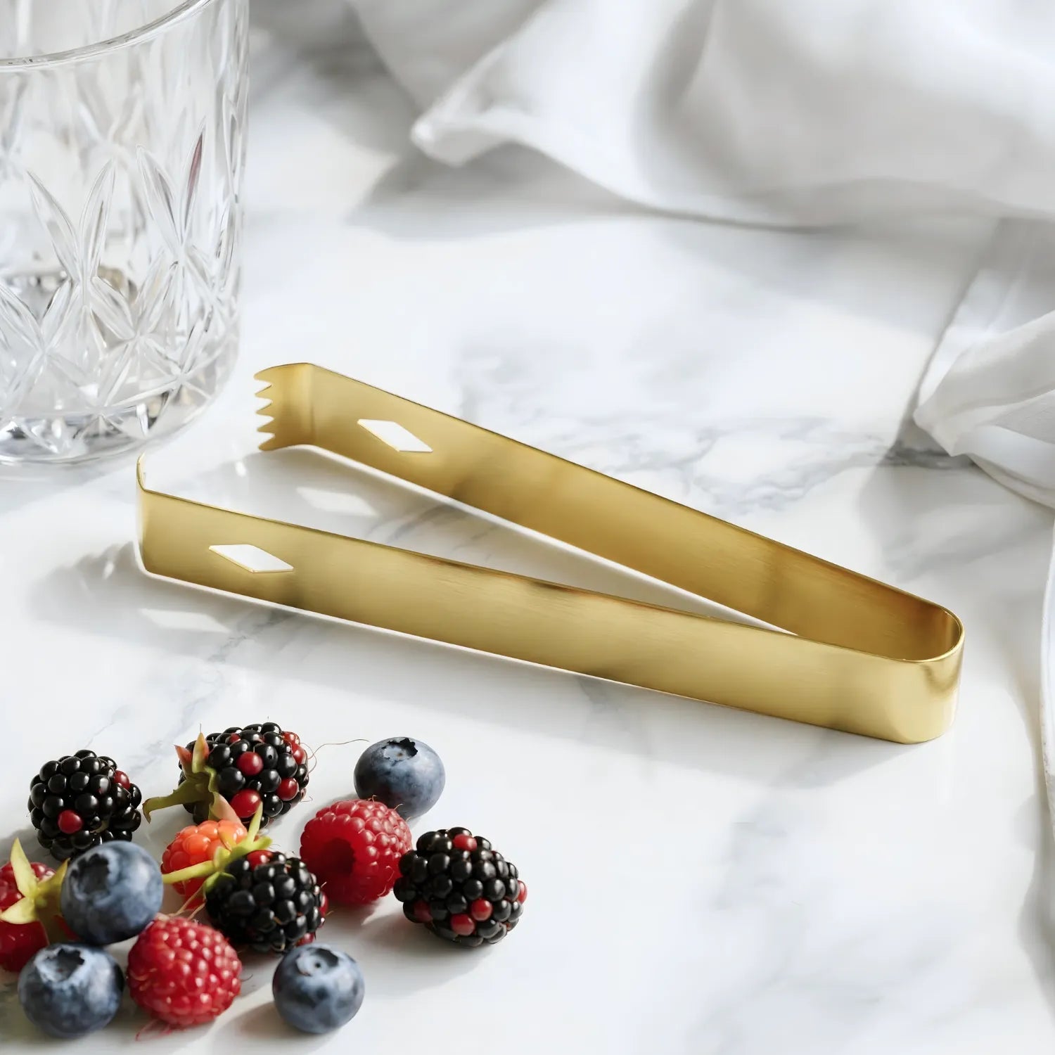 gold stainless steel ice tongs detail view