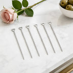 heart cocktail picks on a home bar counter