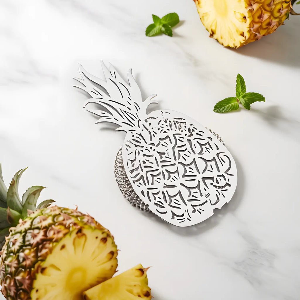 pineapple strainer on a home bar counter