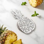 pineapple strainer on a home bar counter