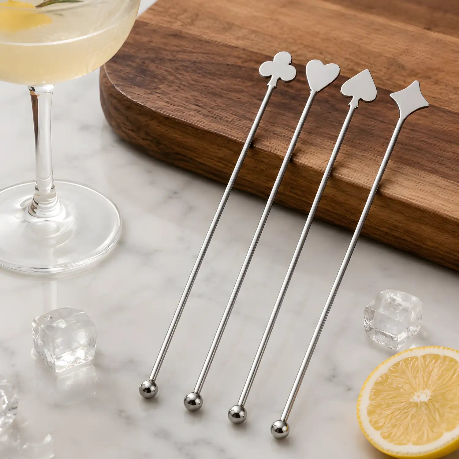 playing card swizzle sticks on a home bar counter