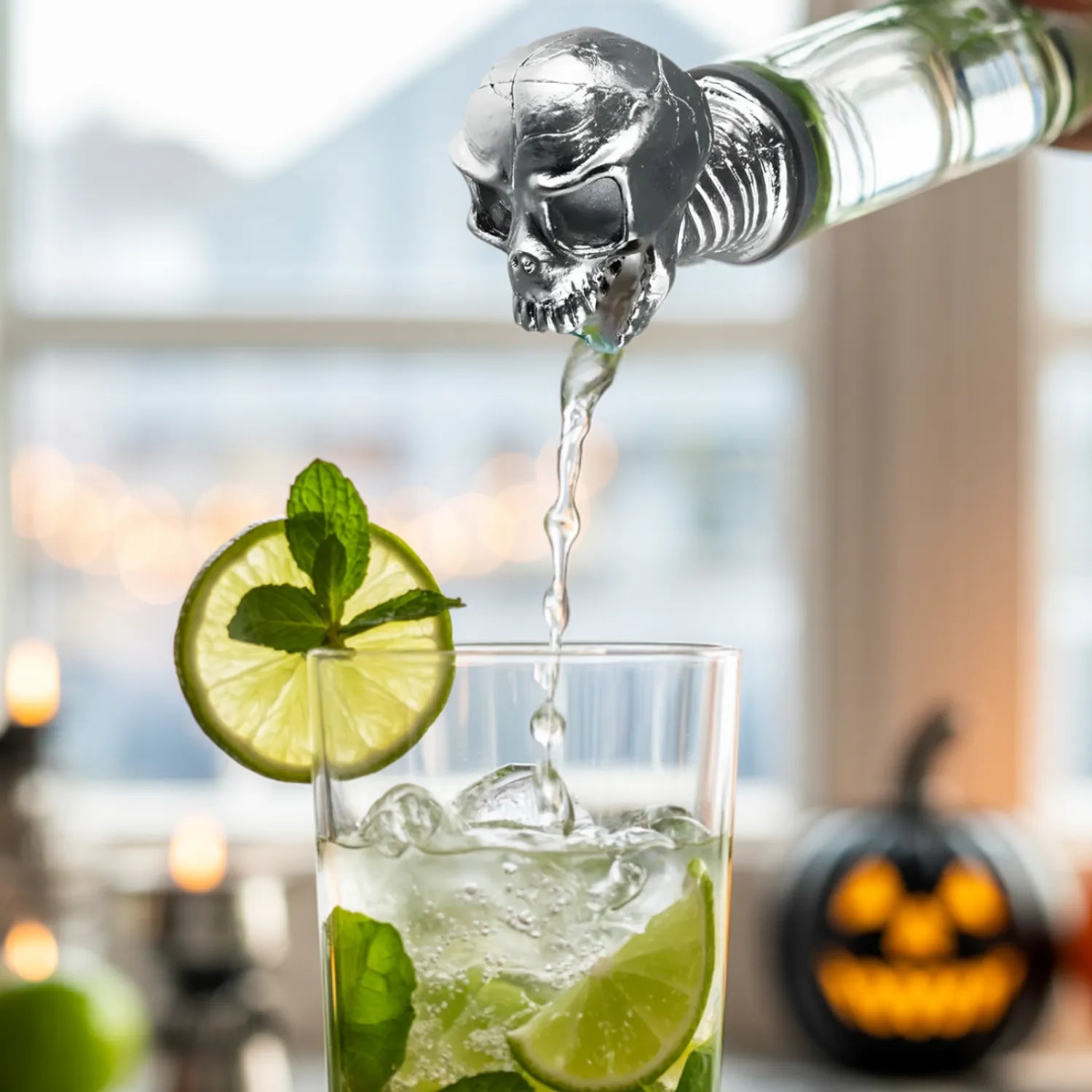 bottle with a skull pourer in use