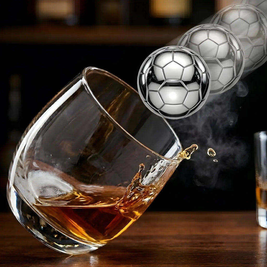 soccer stainless steel ice cube added to whiskey