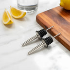 speed pourers on a home bar counter