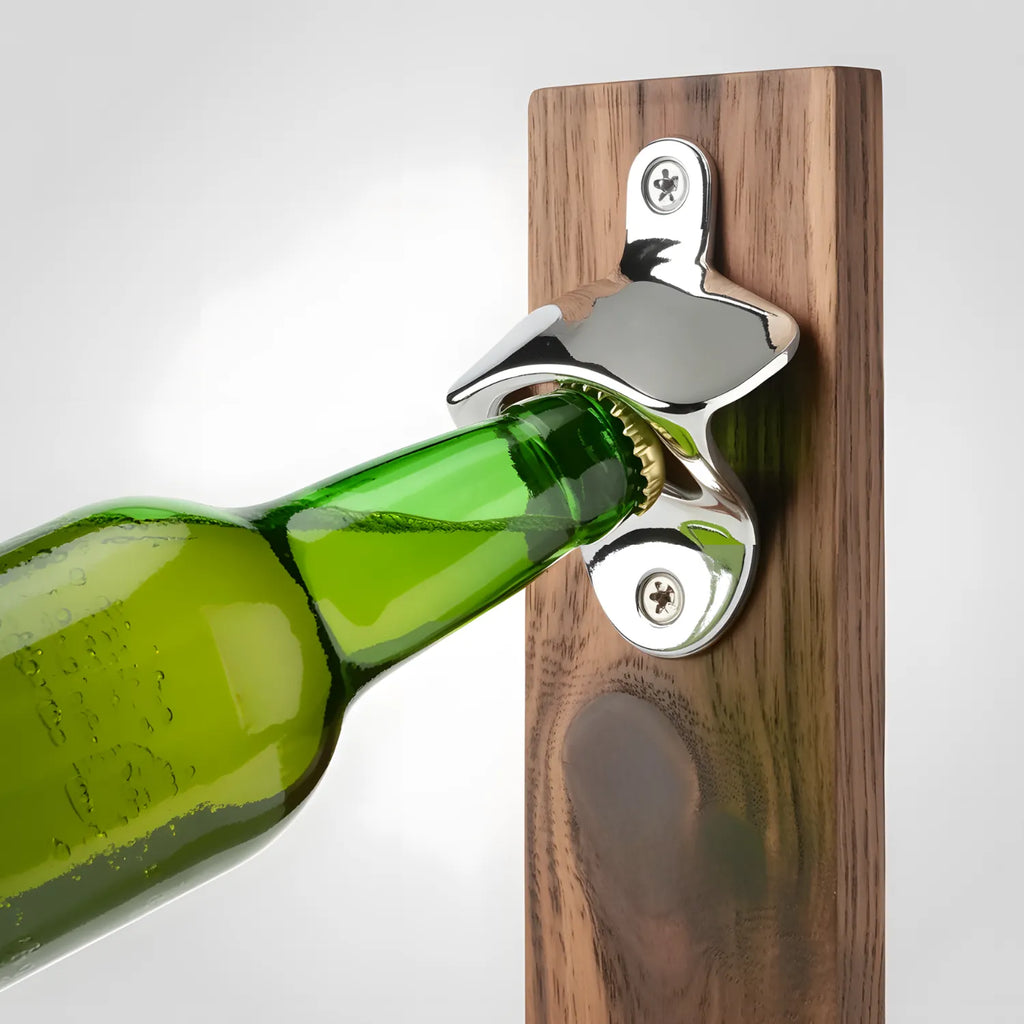 wall-mounted bottle opener in use
