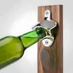 wall-mounted bottle opener in use